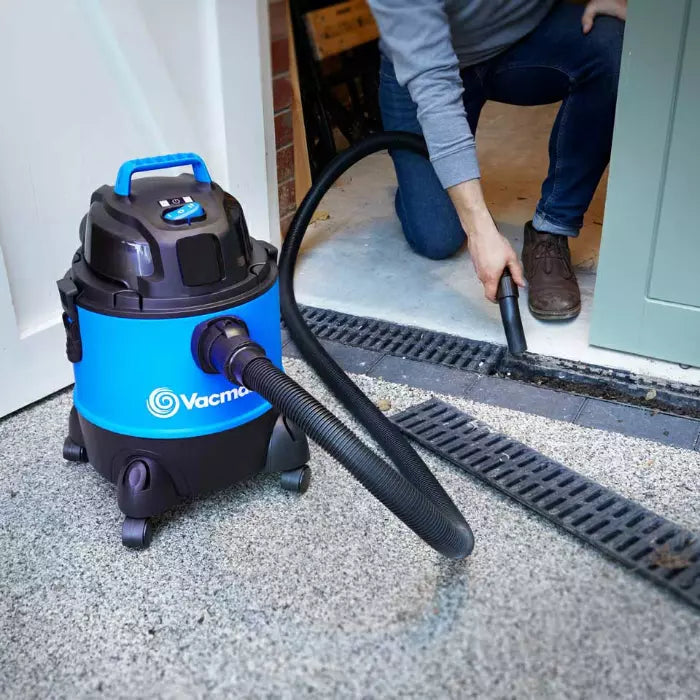 Vacmaster Multi 20 with an Extra Long Hose, cleaning a gutter