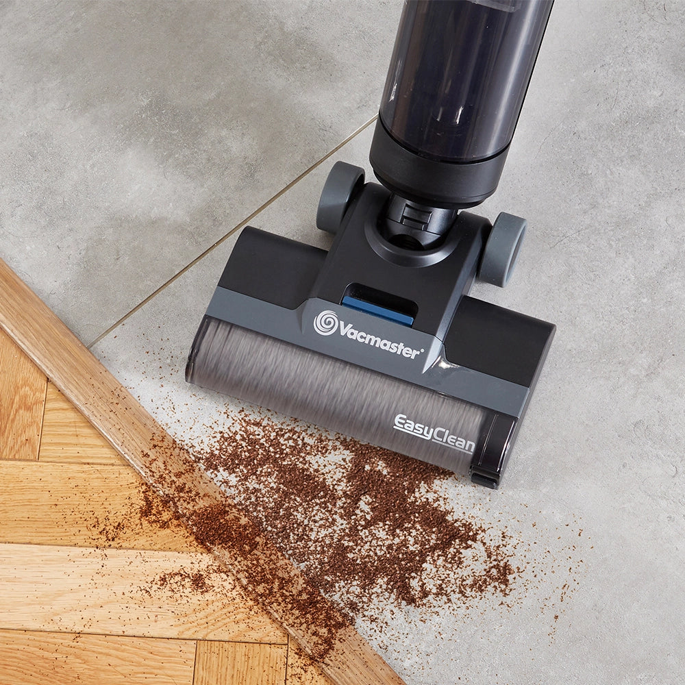 Vacmaster HA2203EU Hard Floor Cleaner cleaning dust and coffee grounds on floor