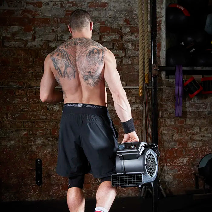 Vacmaster Cardio 54 Fitness Fan being carried easily by weight lifter AM120R-03