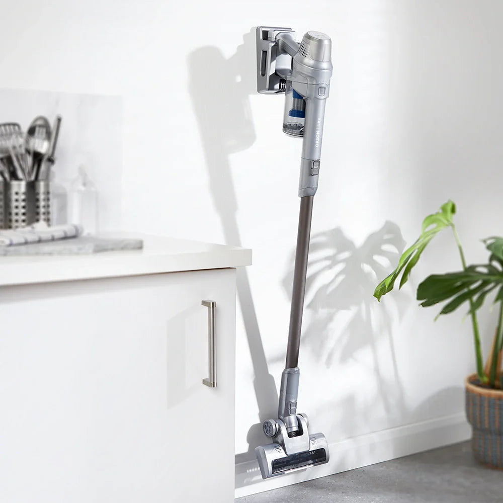 Vacmaster Orson Lite 24V Cordless Upright Vacuum hung on the wall in a UK home