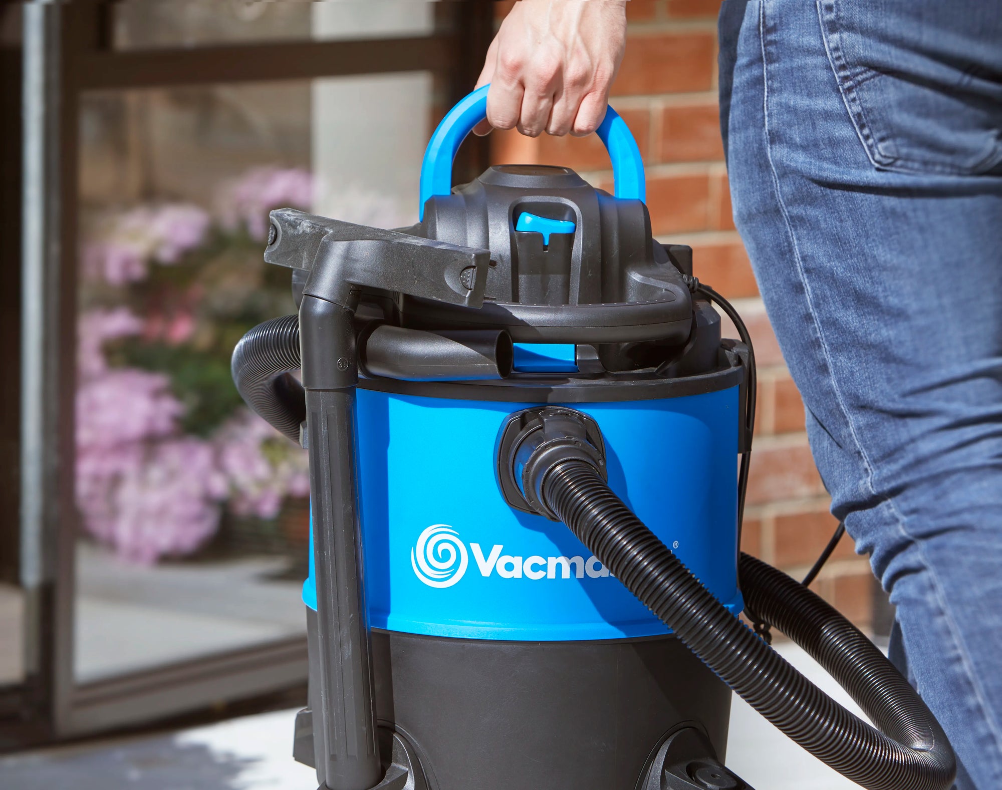 Vacmaster Wet Dry Vacuum Cleaner Blower being carried VBVB1223PF 03